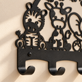 Metalen wandkapstok met safaridieren als praktische decoratie voor de kinderkamer.